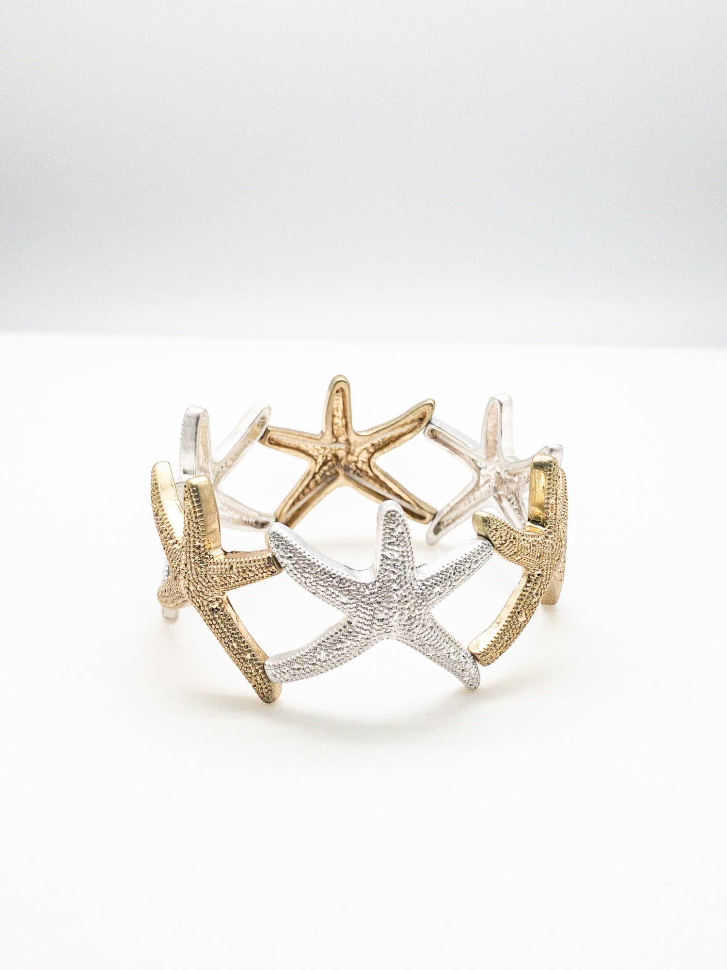 2 toned silver and gold starfish stretch bracelet