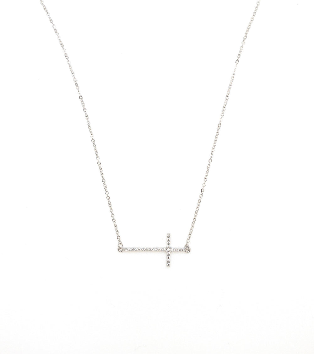 Silver sideways cross necklace. 