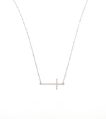 Silver sideways cross necklace.