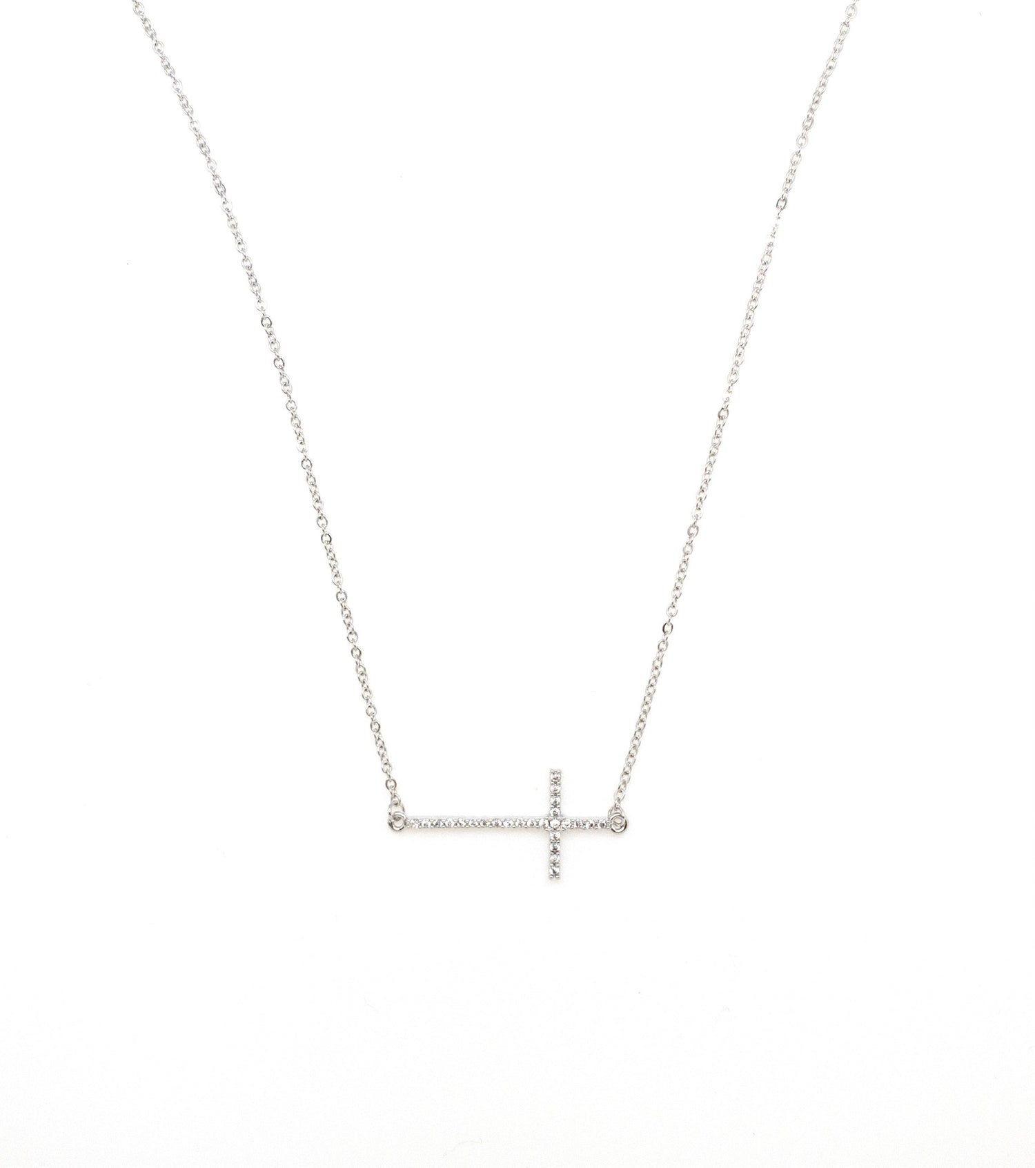 Silver sideways cross necklace.