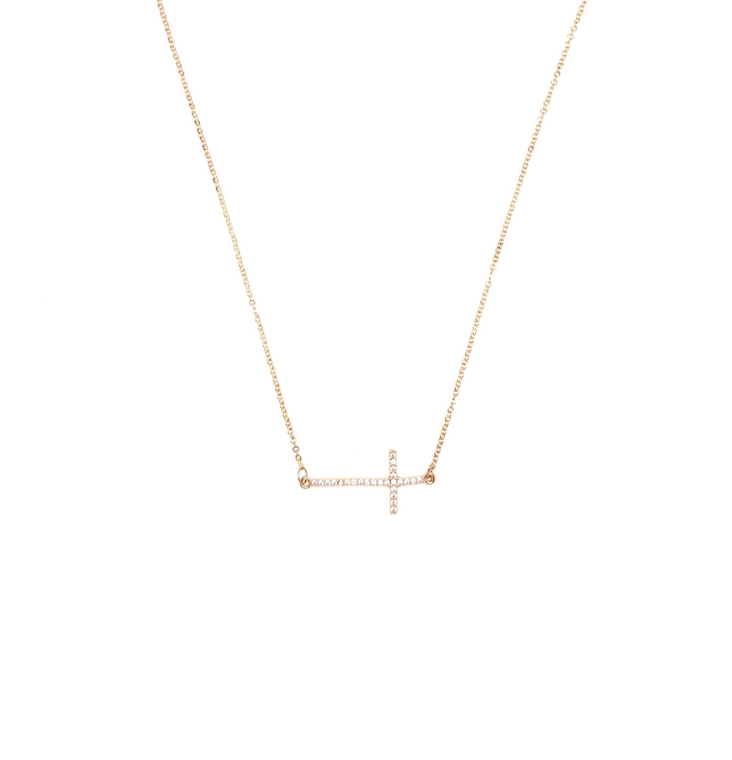 Gold sideways cross necklace.