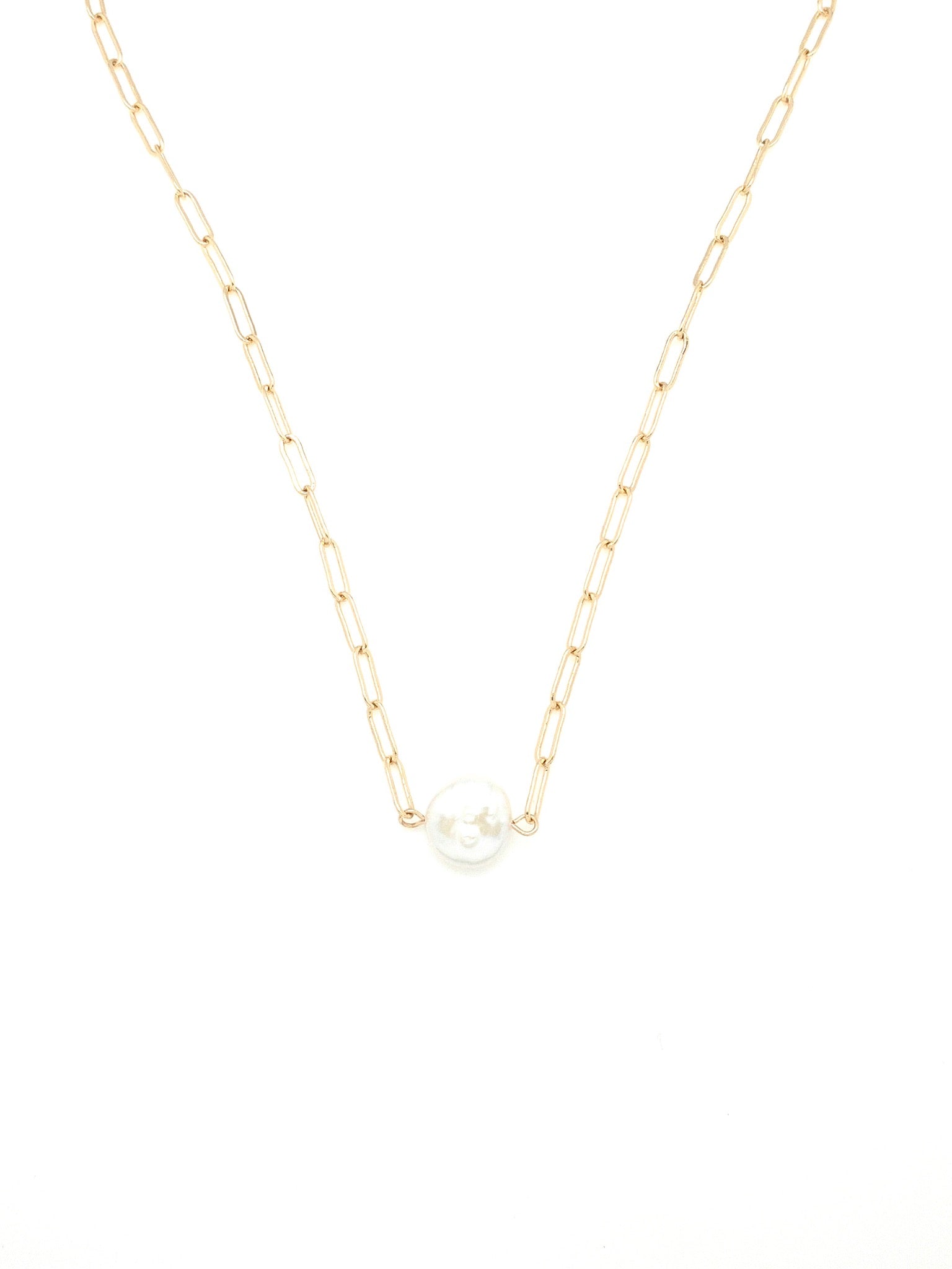 coin shaped pearl on a gold chain necklace 