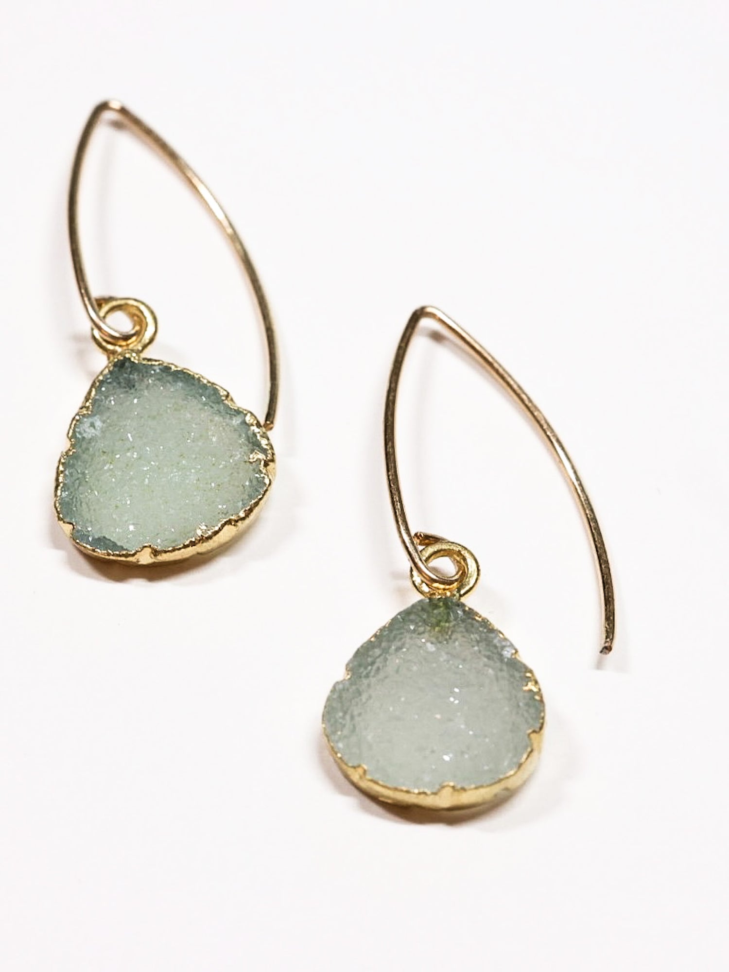 Nova Aqua Teardrop gold filled earring flat lay