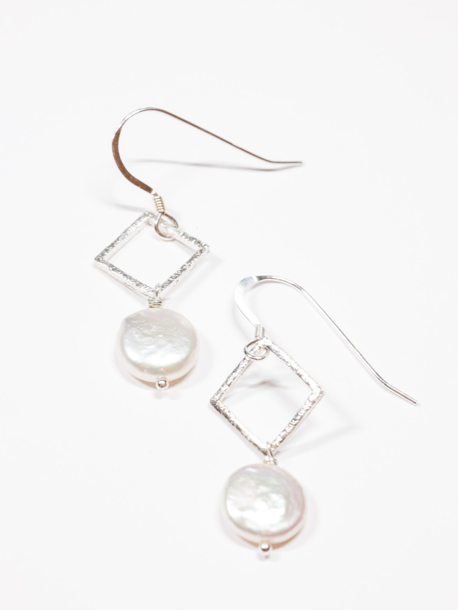 Lumen pearl drop nh earrings in sterling silver