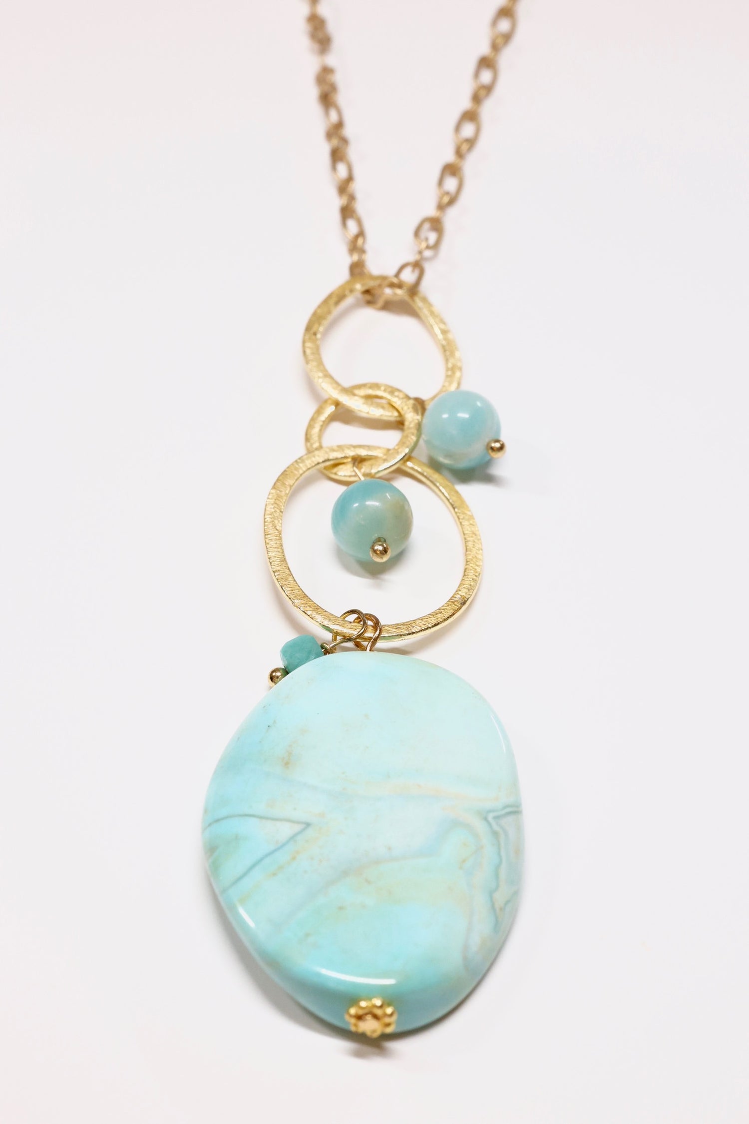 Long Aragonite necklace flat lay