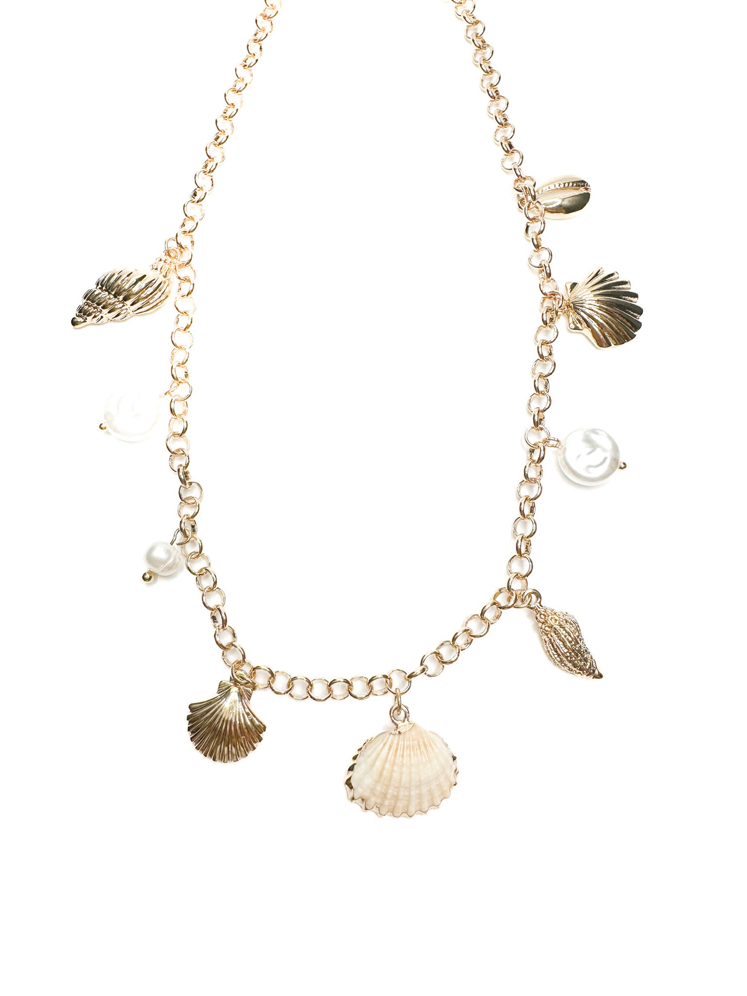 Gold necklace with shell charms on a white background