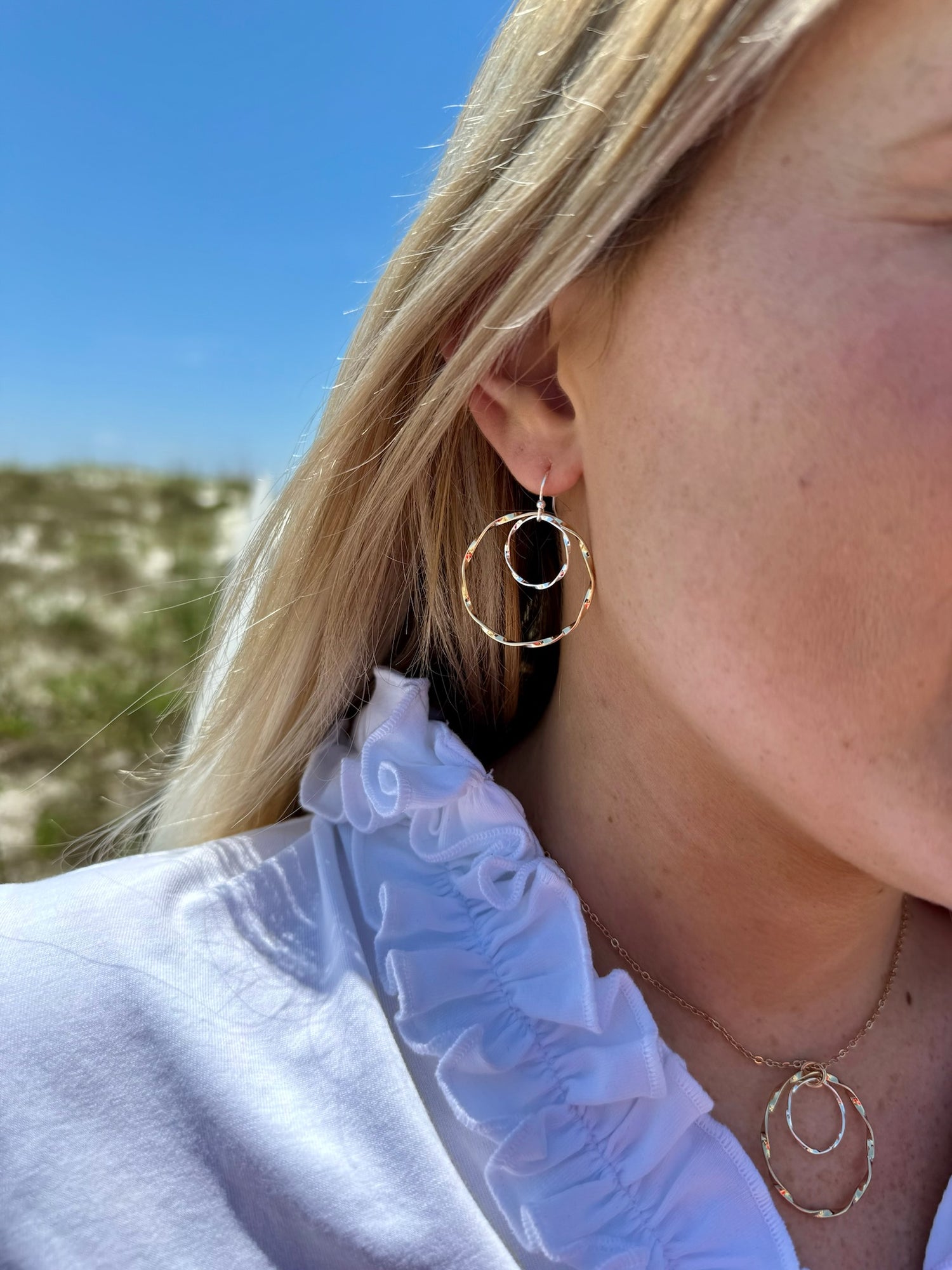 Bonnie Silver and Gold Earrings shown on model