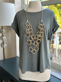 Necklace styled with Trina top in sea grass 