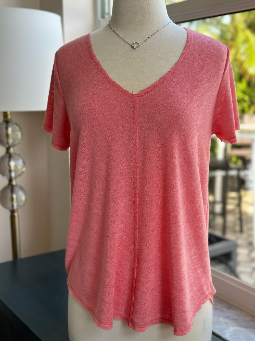 Valerie top in coral styled on mannequin 