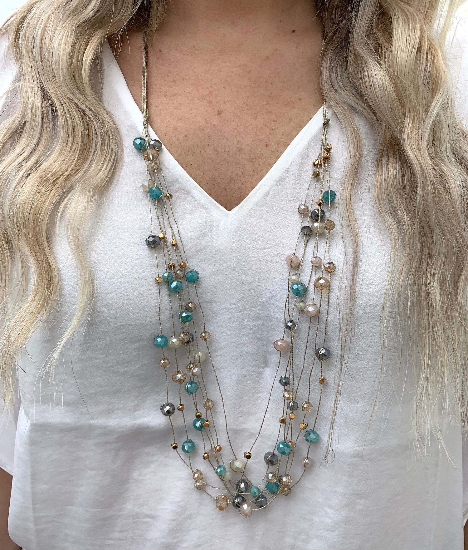 Stella Beaded Necklace- Aqua/ Pink on model.