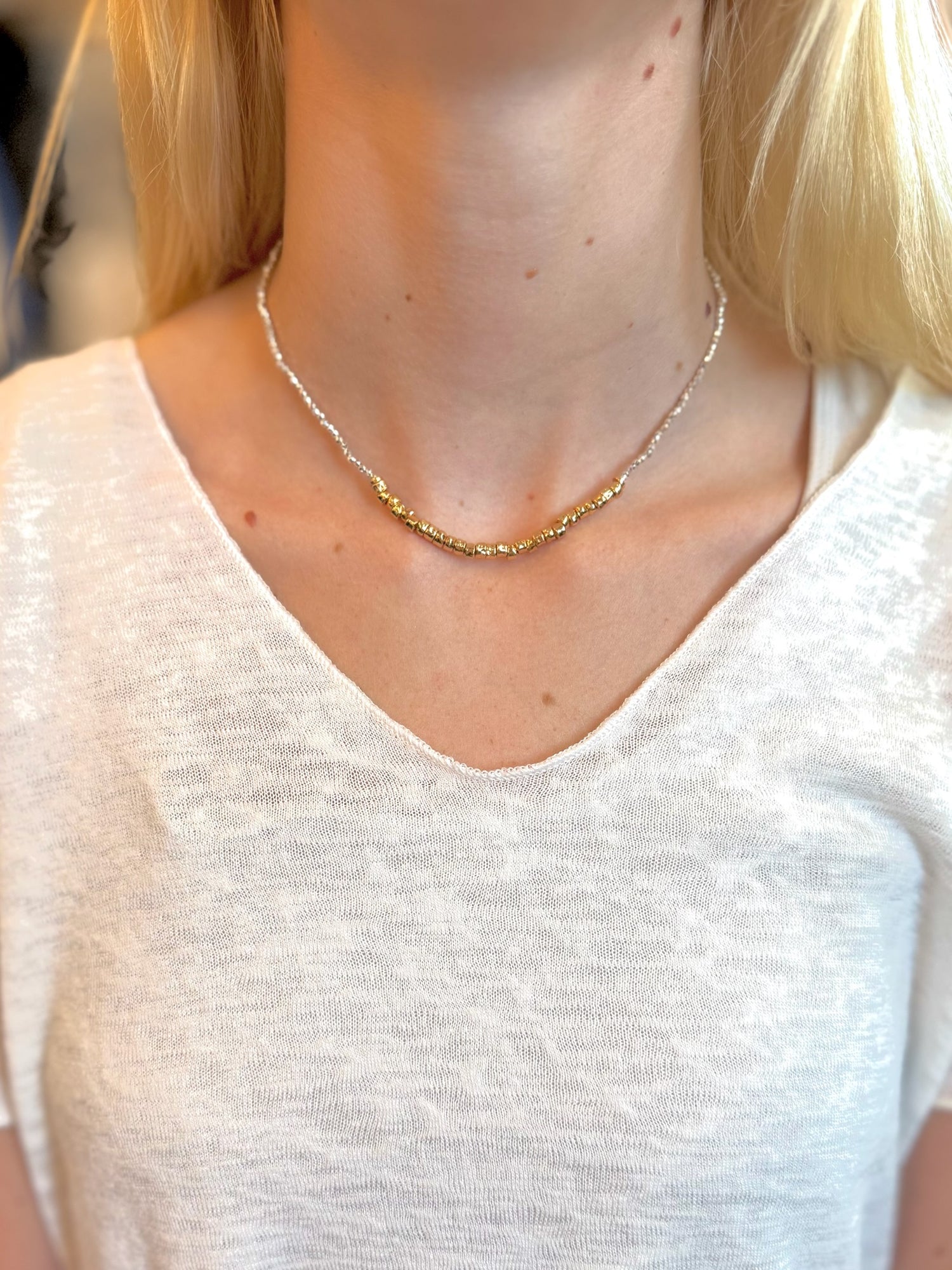 Silver necklace With gold beads