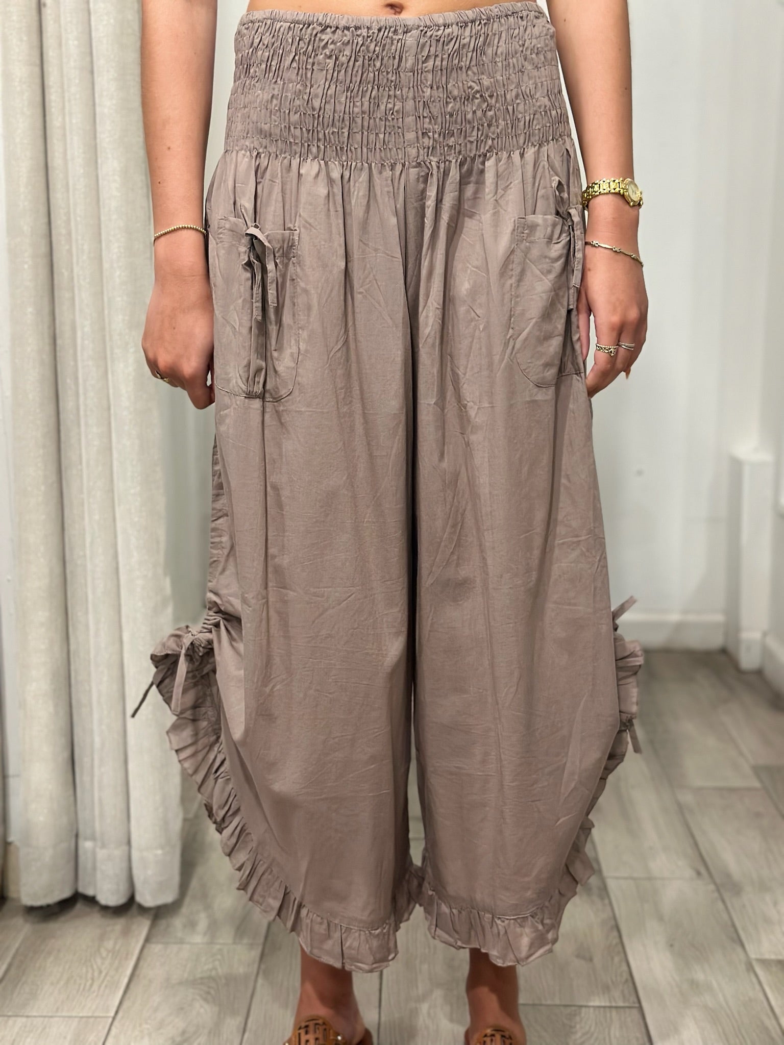 front view of woman wearing one size pants