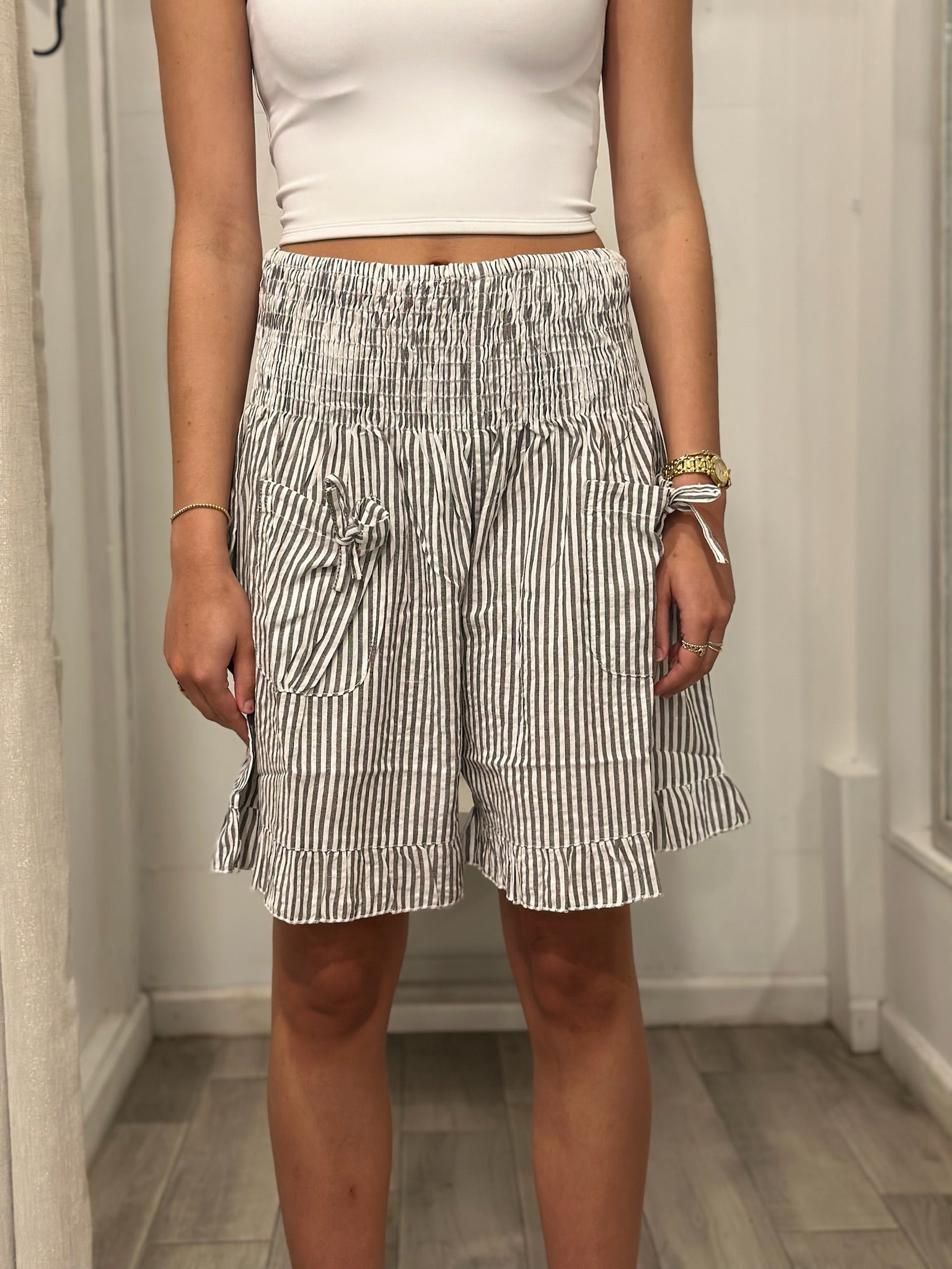 front view of woman in shorts