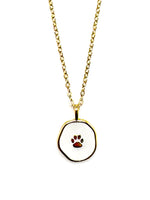Necklace with a paw print pendant on a white background
