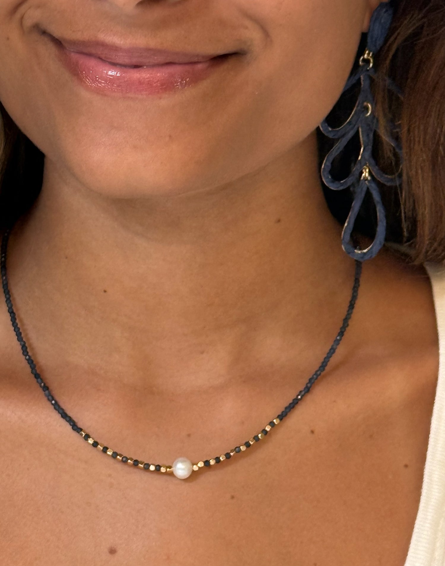 Zipporah Necklace in Dark Blue on model