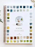 Winter Watercolor Workbook front cover with watercolor snowglobe and color palette border, spiral bound by Emily Lex