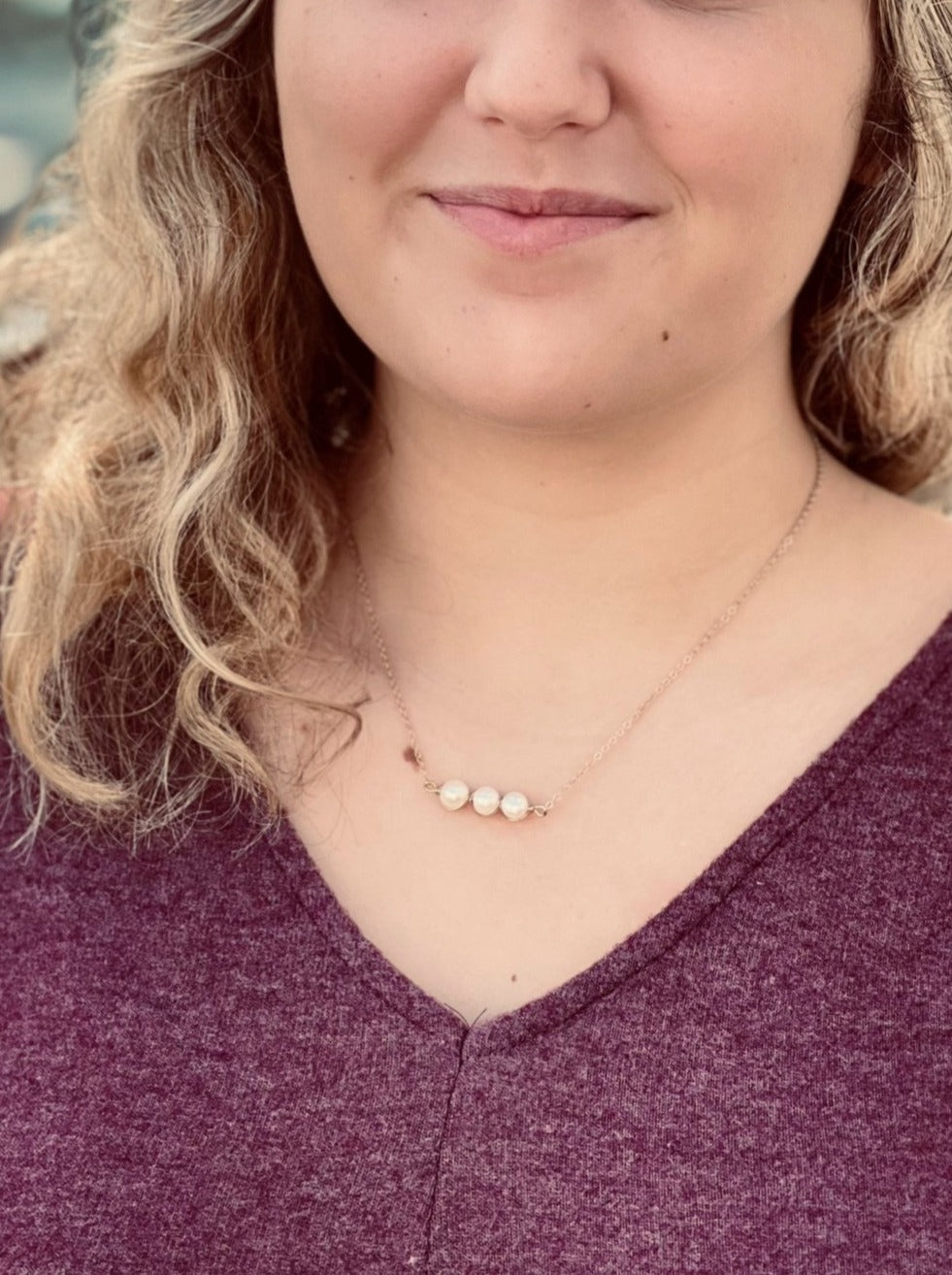 Hannah Pearl Necklace in gold. Shown on model.