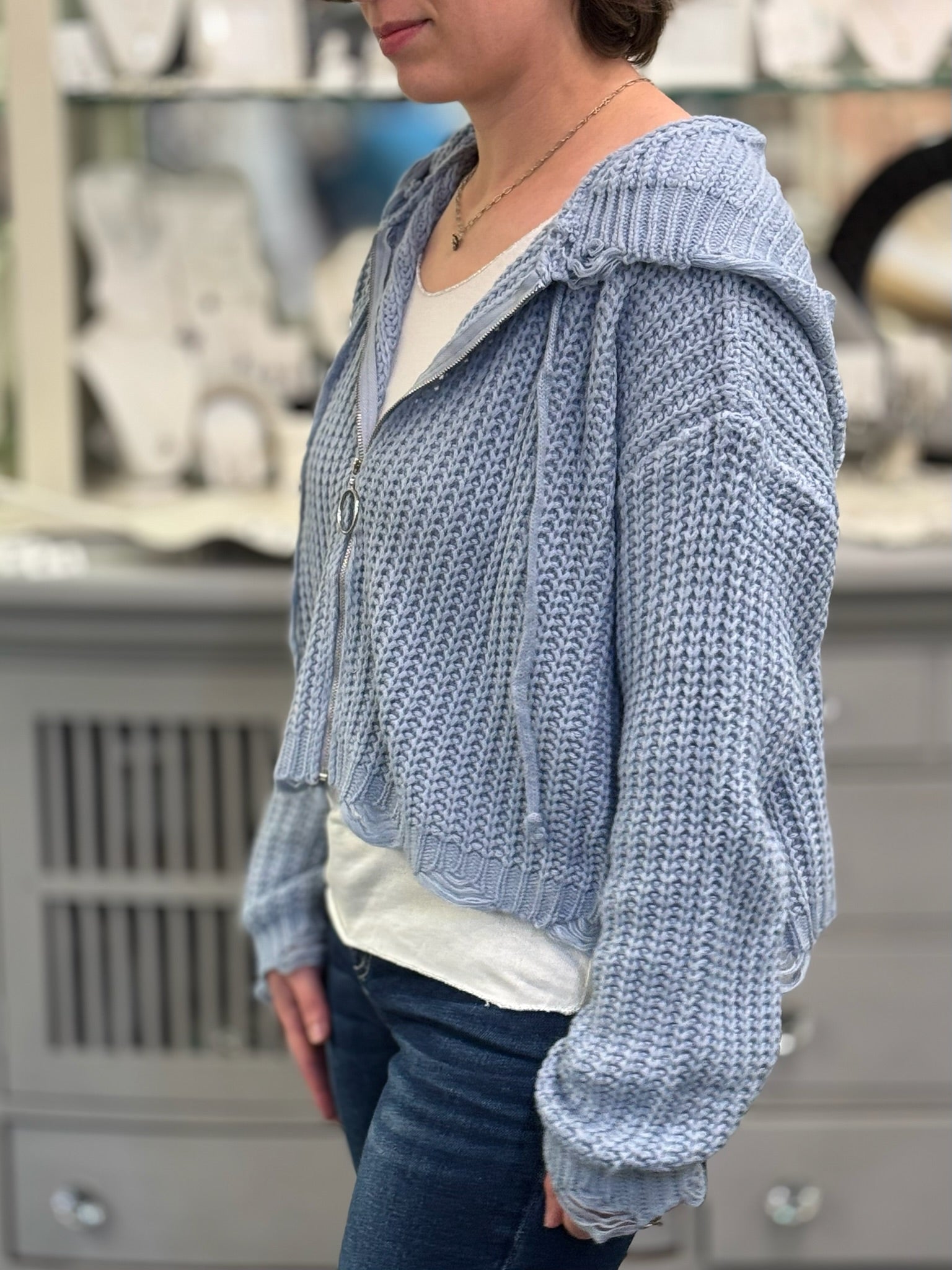 woman in cardigan zip up