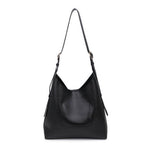 Black leather handbag on a white background
