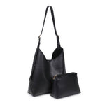 Black leather handbag with matching pouch on a white background