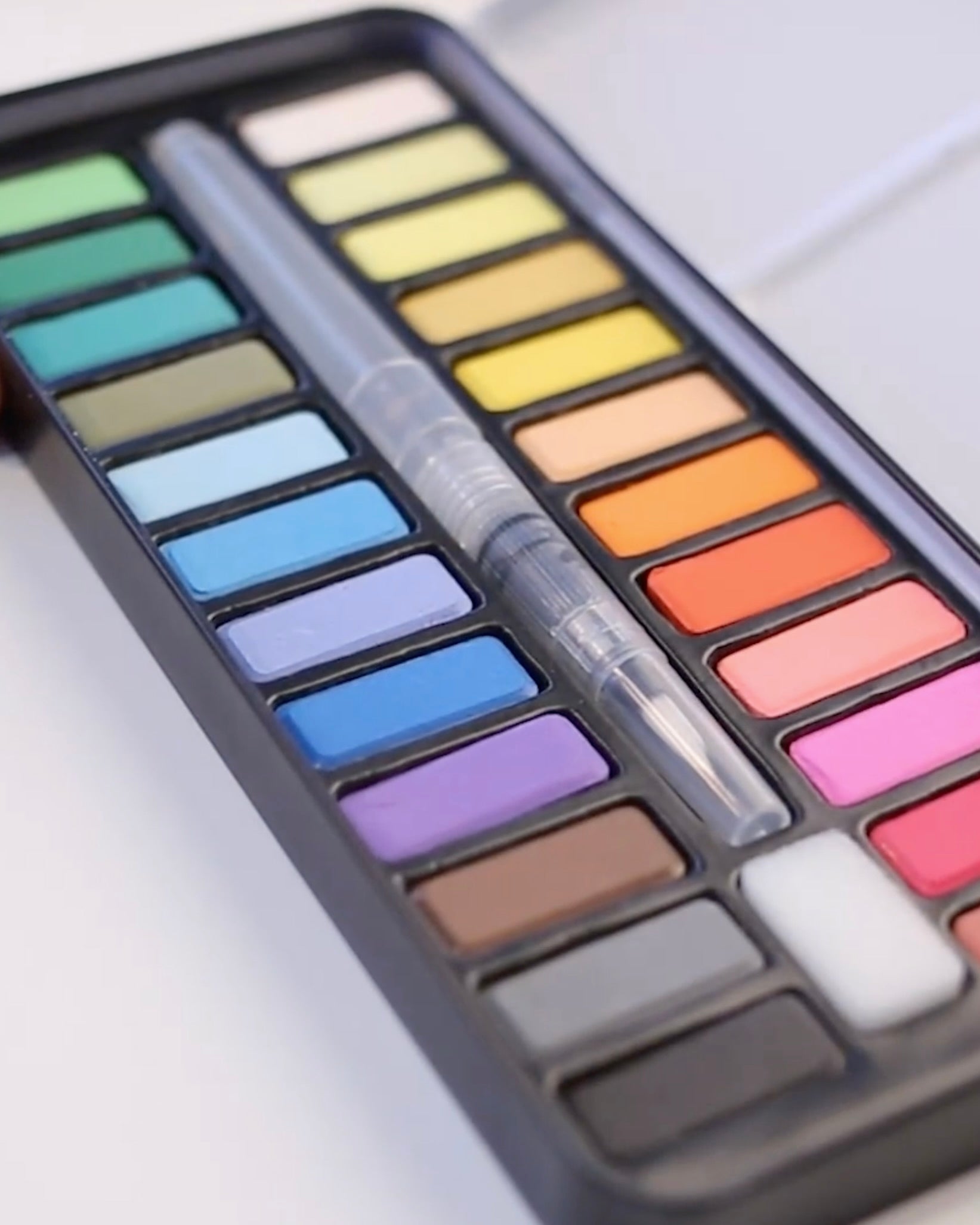 24 Color Watercolor Palette close-up detail showing colors and water brush pen