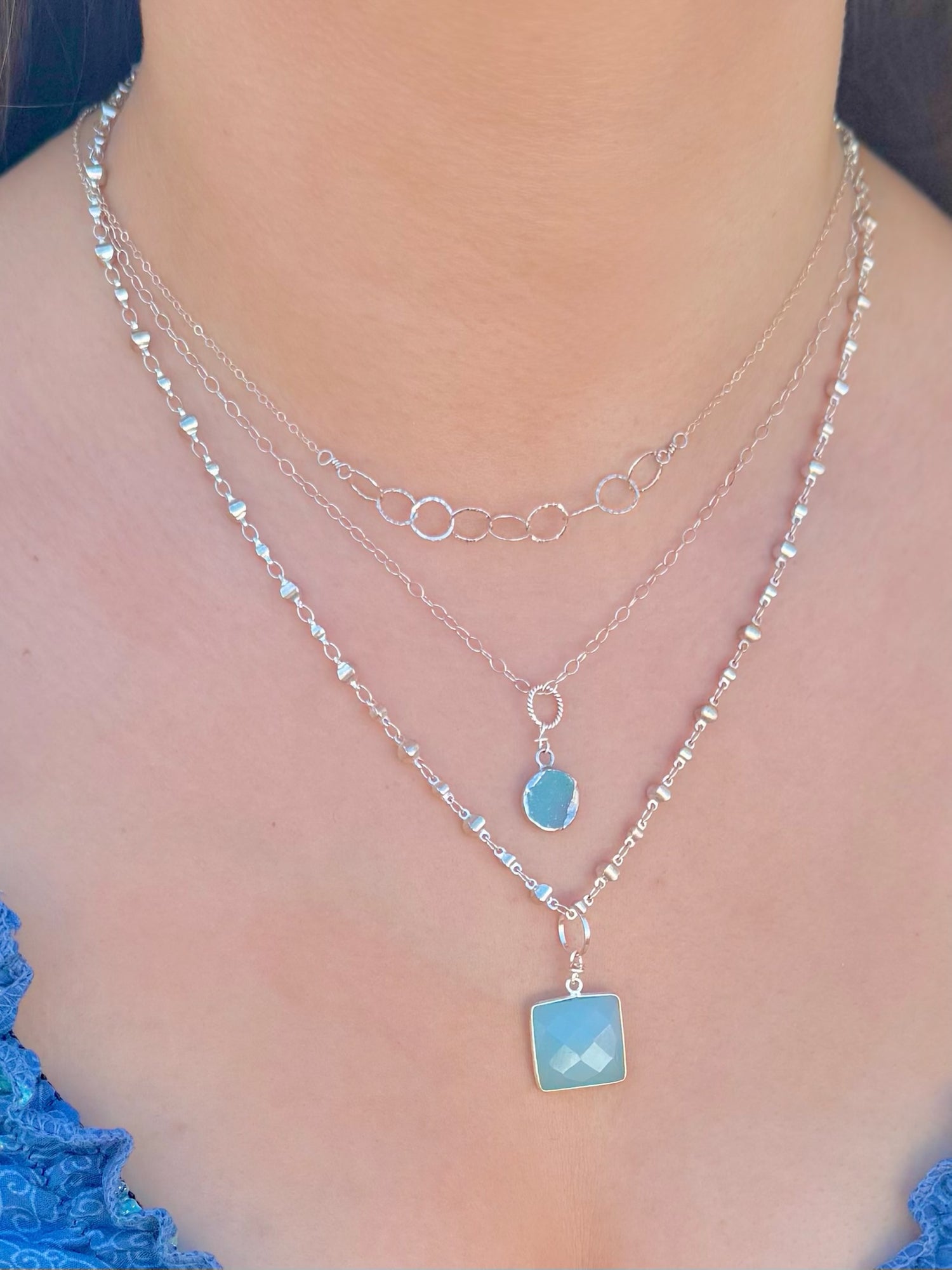 3 Necklaces Layered on model using the Premium Silver Triple Layering Magnetic Clasp