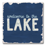 Decorative coaster with 'welcome to the LAKE' text on a blue background