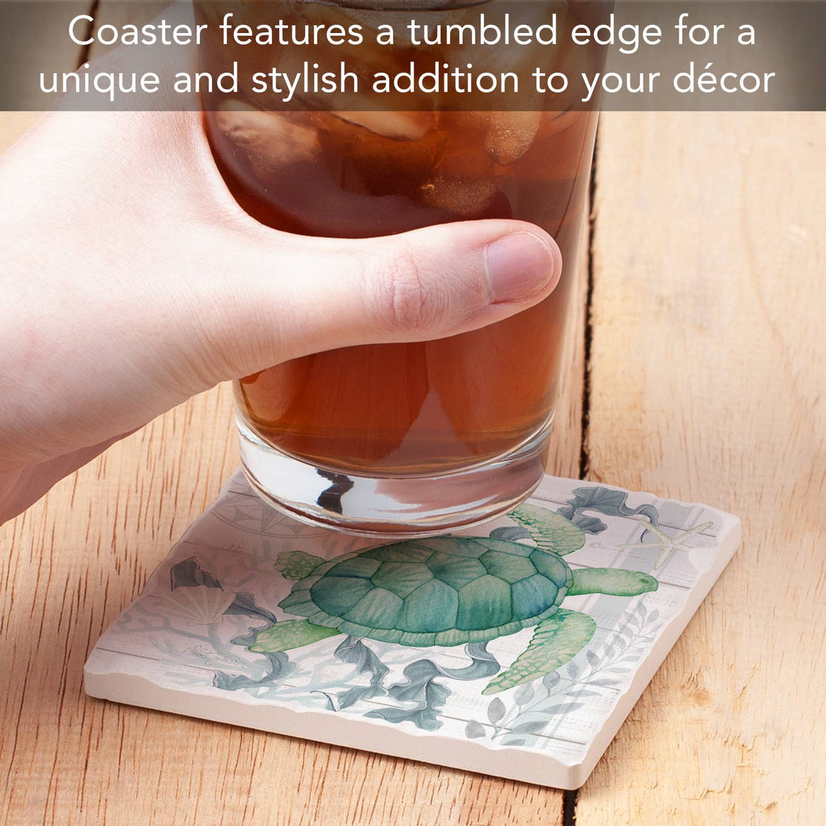 Coaster with turtle design holding a glass of iced tea on a wooden surface