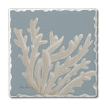 Decorative tile with beige coral design on a blue background