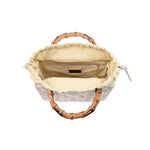 Handbag with bamboo handle on a white background