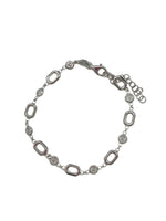 Silver bracelet with oval links on a white background