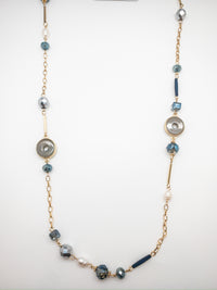 Faryn Necklace. Gold chained with blue and pearl bead accents