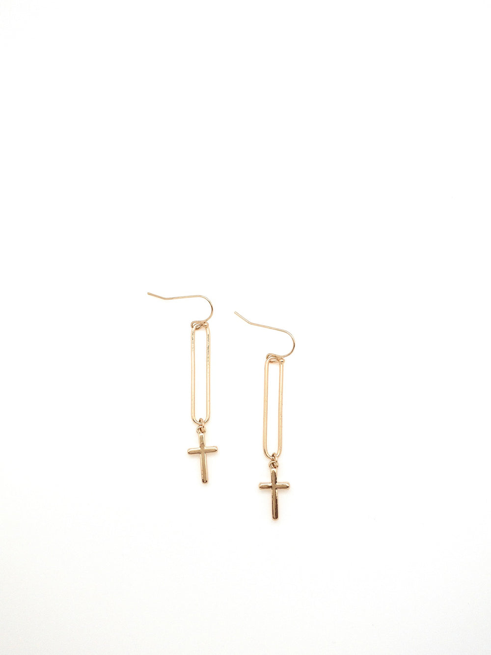 Gold Naomi dangle earrings with a cross at bottom