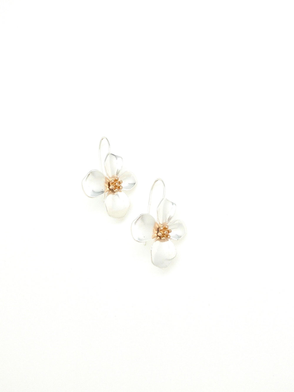 silver magnolia flowers with a gold center 