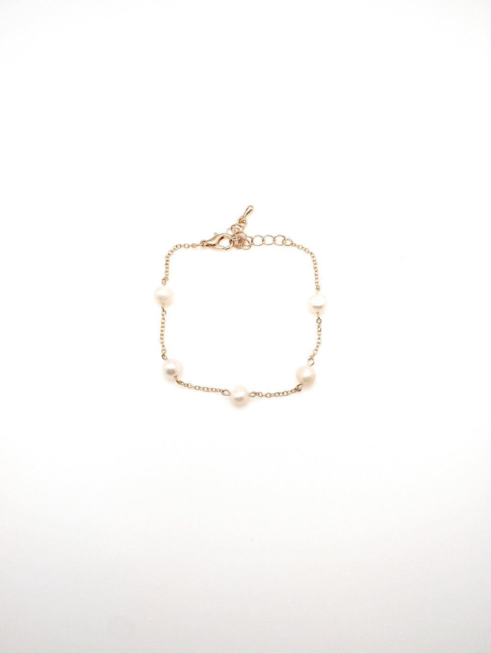 Scattered pearls on gold chain bracelet adjustable 