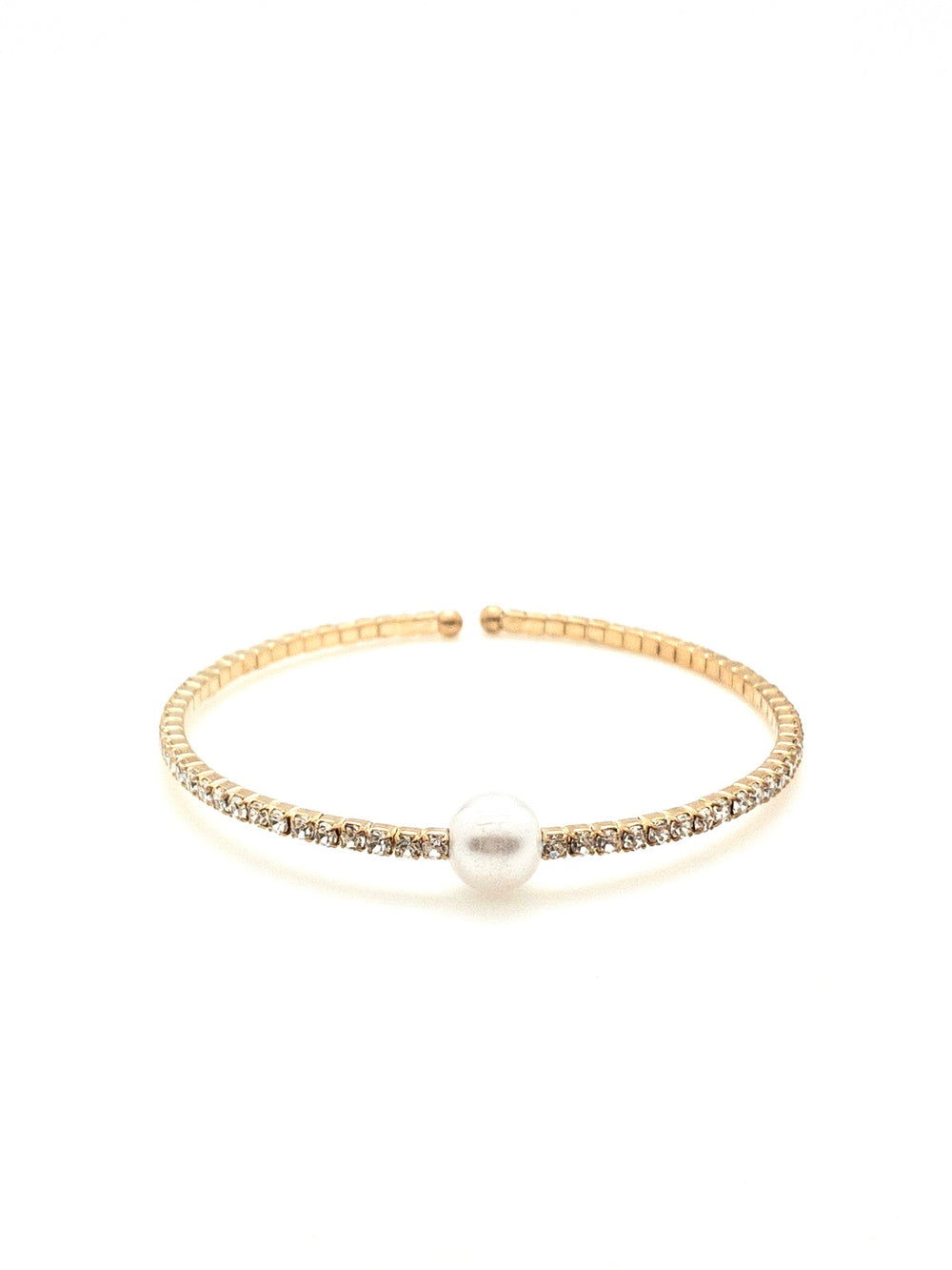 sparkly gold cuff with a pearl in the center 