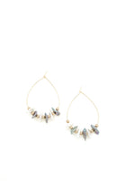 unique shaped pearls white and grey with gold accents. hoop