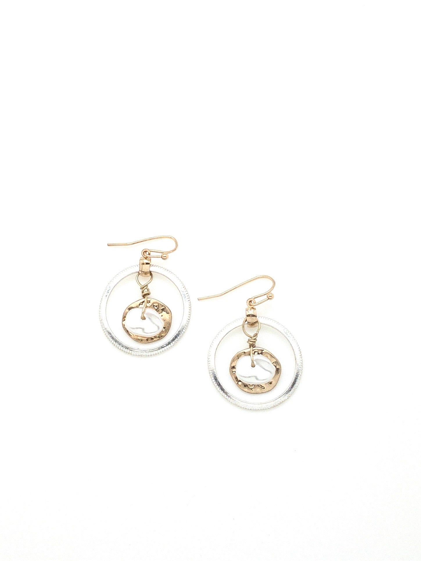silver halo around a gold coin with flat white pearl attached. mixed metal earrings 