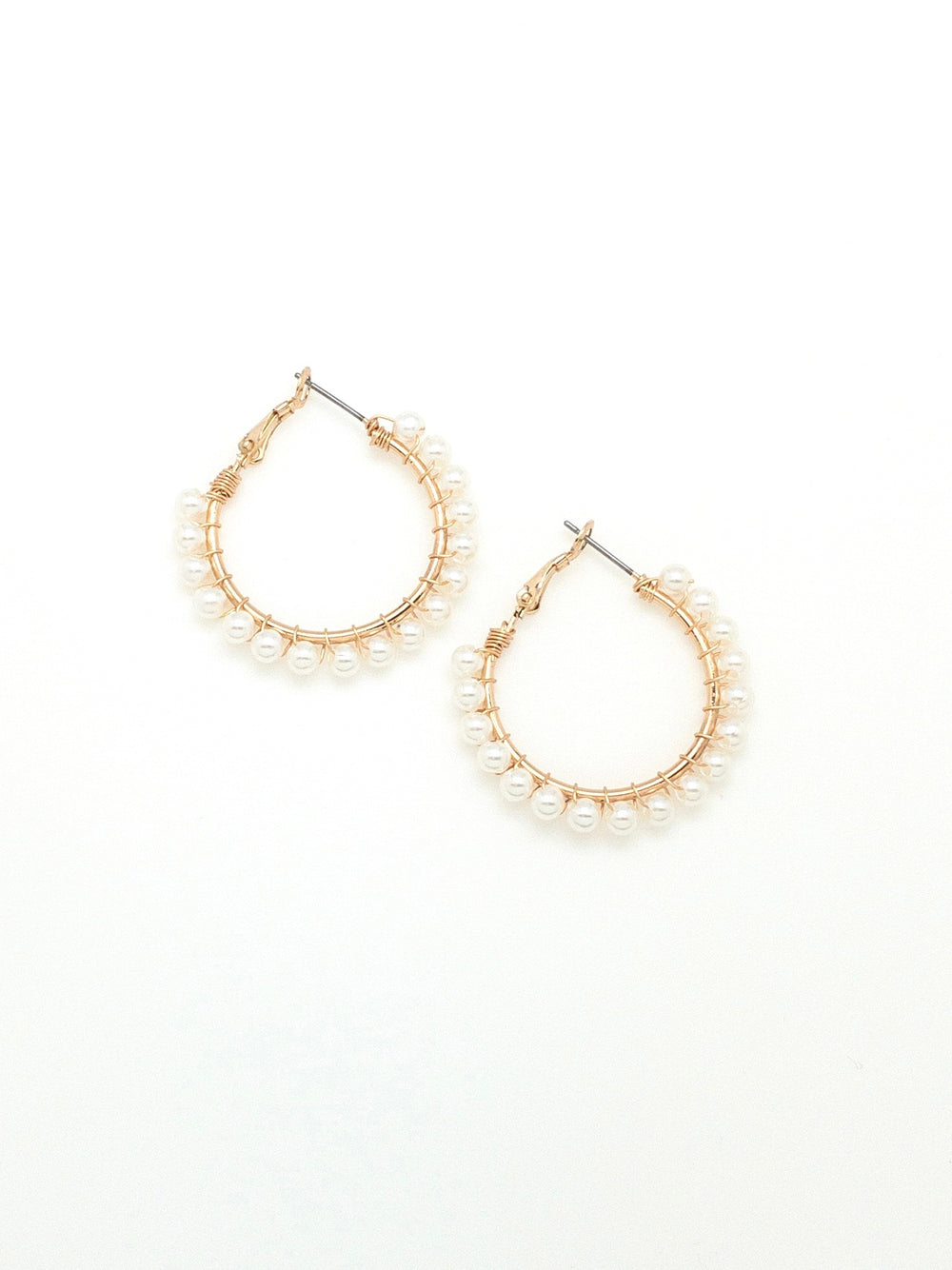 gold hoops with wire wrapped pearls on them