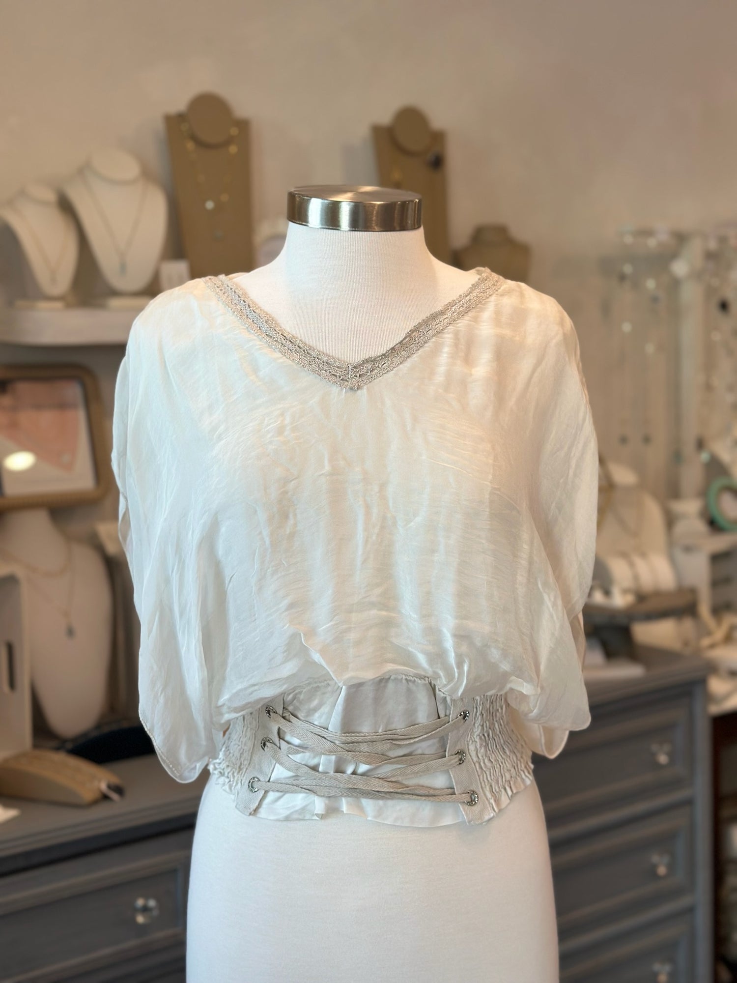 Alix Italian Silk Blouse in off-white on mannequin