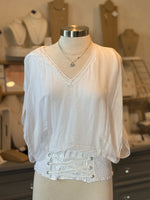 Alix Italian Silk Blouse in White on mannequin