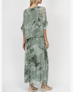 Back view of the Ariella Silk Dress in Olive showing the flowy silk skirt and overlay at Ardor Boutique.