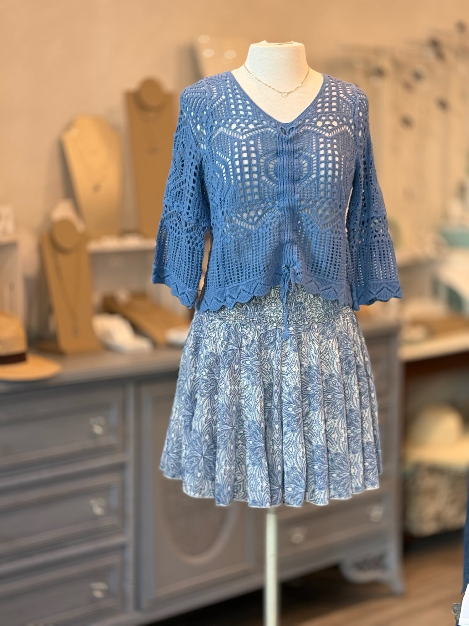 Aurora Top Sweater in Denim Blue on mannequin styled with blue pattern skirt
