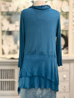 Back view of Clara silk cardigan in Prussian blue showing the back silky layers