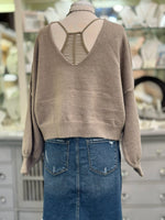 Back view of mocha reversible cropped sweater styled with taupe racerback bralette and V in the back