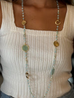 Beatrix Necklace in Teal on model showing length