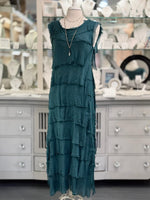 Full-length view of the Italian-made Briella Dress in peacock green, one-size fit for timeless elegance. Paired with layered necklaces