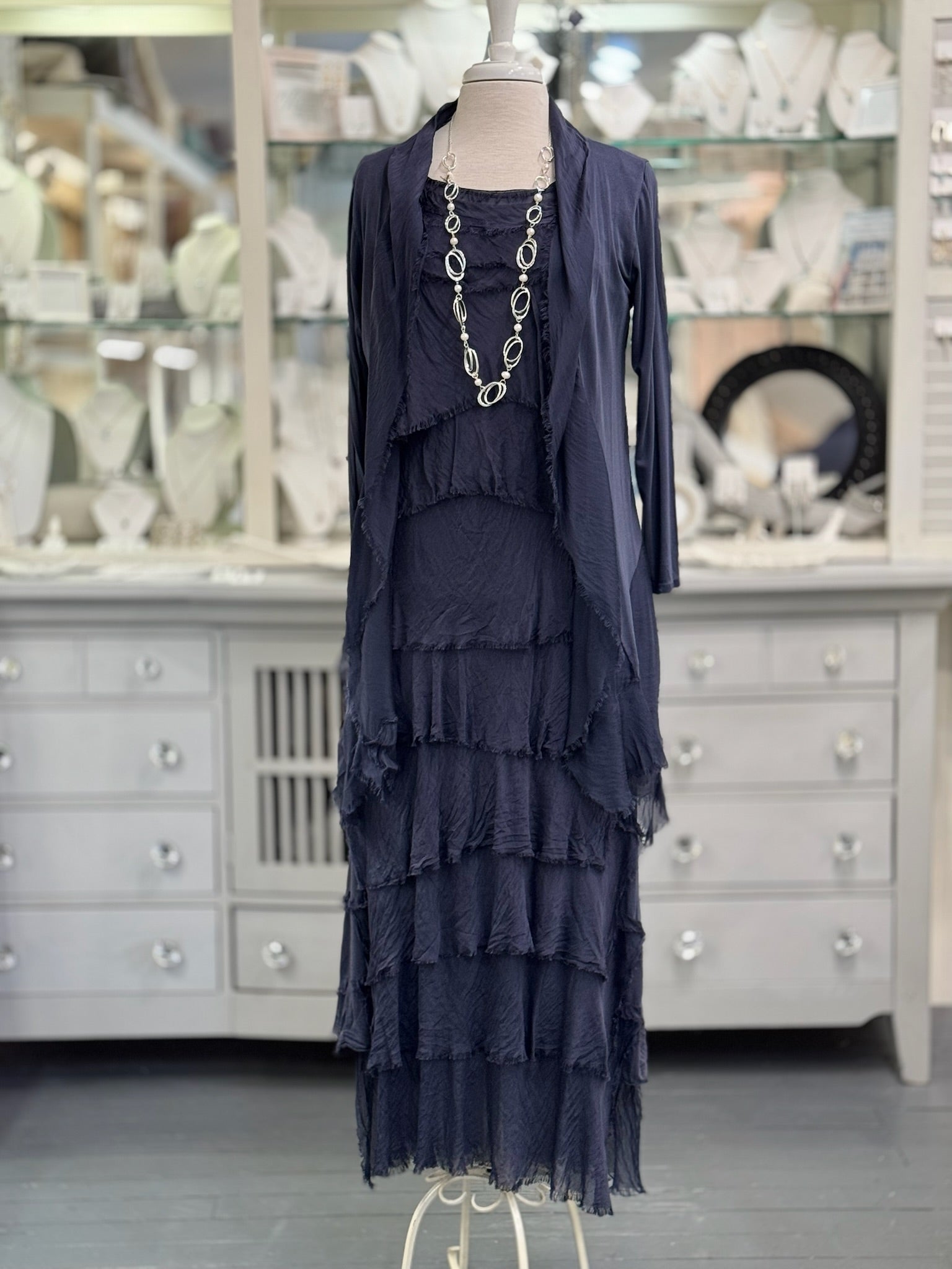 Briella Layered Silk Dress Navy paired with Clara silk cardigan in same color and long silver pearl necklace
