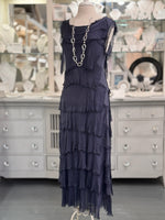 Briella Layered Silk Dress in navy, made in Italy with flowing washable silk tiers. Styled with long pearl and silver necklace