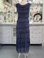 Back view of the Briella Silk Dress in navy showing the layered silk texture and graceful drape.